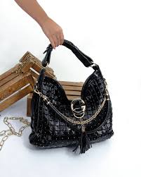 کیف چرم زنانه مجلسی لوکس با طراحی چشم نواز